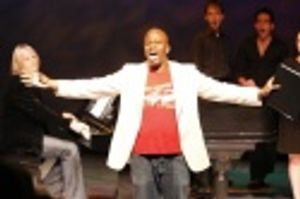  Tituss Burguss performing "Wake Up" (Book & Lyrics by Harris Doran, Music by Arthur  Photo