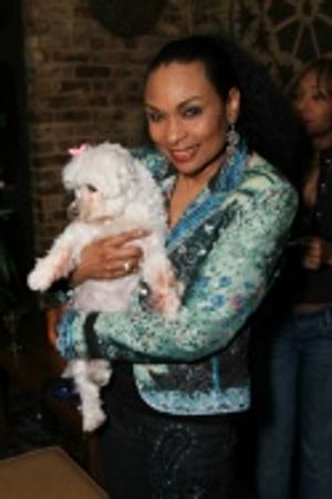 Cast member Vivian Reed with Mickey the Dog, who made his stage debut as "Princess Eb Photo