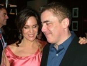 Polly and Adam share a special moment
amongst all the press Photo