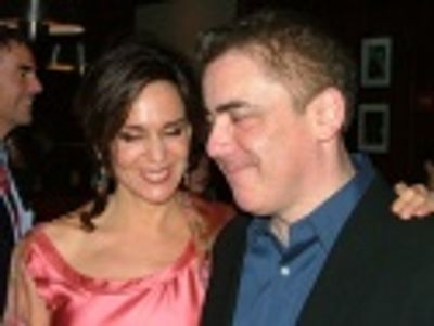 Polly and Adam share a special moment
amongst all the press Photo