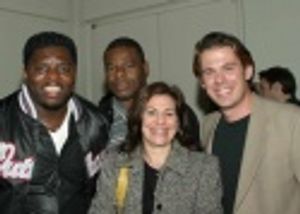 Harrison White (Richard), Stuart Ambrose (Minister) and friend surround their agent V Photo