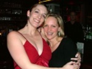 Paige Price and Julia embrace after the performance Photo