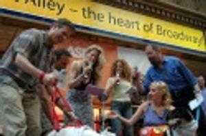 Bernadette Peters with the cast of Spamalot Photo