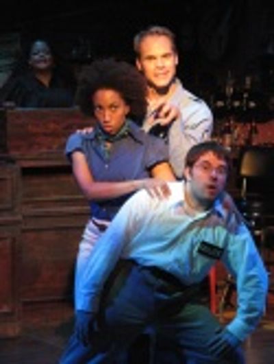 (Top to bottom) David Jon Wilson as Officer Bell, Marcie Henderson as Tish Thomas, an Photo