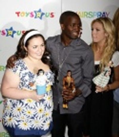 Nikki Blonsky, Elijah Kelley and Brittany Snow with their dolls Photo