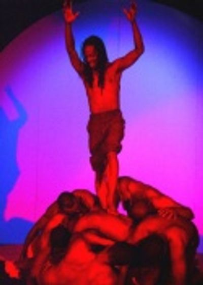 Kony (Anthony Salas) and Ensemble Photo