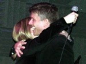 A tearful (yet happy) embrace Photo