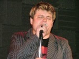 Rob Evan sings "A Kiss is a Terrible Thing to Waste" from
Whistle Down the Wind Photo