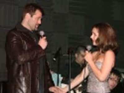 Another reunion takes place at Joe's Pub when
Marc Kudisch and Jessica Grove sing As Photo