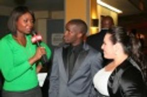 Elijah Kelly and Nikki Blonsky being interviewed by CNN's Lola Ogunnaike Photo