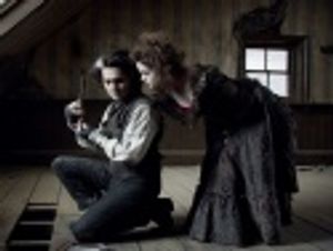 Johnny Depp as Sweeney and Helena Bonham Carter as Mrs. Lovett Photo