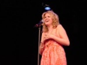 Jessica Skerritt singing "Dreaming Wide Awake" Photo