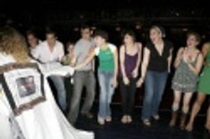 Amber Stone with Max Crumm, Laura Osnes and cast members Photo