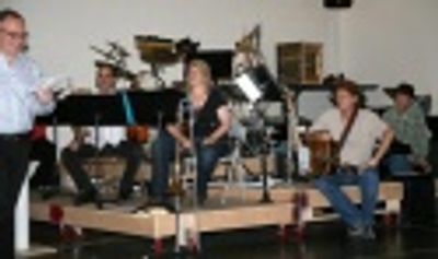 Adrian Bryan-Brown (PR Agent) and Jack Herrick with the band Photo