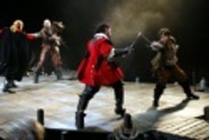 John Schiappa (Athos) and Aaron Tviet (D'Artagnan) battle the Cardinal's men Photo