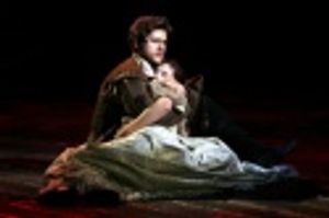 Aaron Tviet (D'Artagnan) cradles Jenny Fellner (Constance) Photo