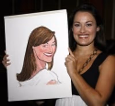 Ashley Brown with caricature Photo
