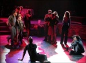 Ty Taylor and Cindy Robinson with the ensemble cast Photo