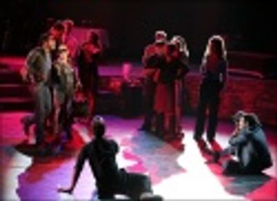 Ty Taylor and Cindy Robinson with the ensemble cast Photo