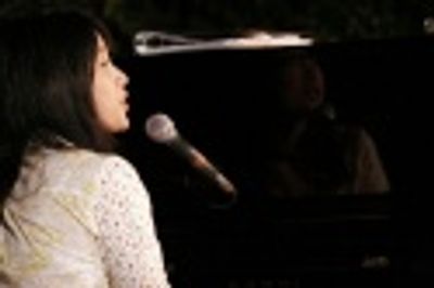 Angela Ai with band Photo
