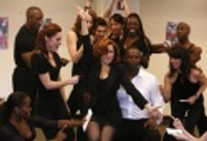 Brian McKnight and Michelle DeJean and the company of Chicago Photo