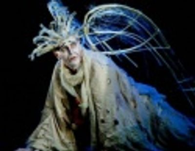 A VERY OLD MAN WITH ENORMOUS WINGS Photo