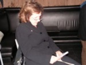 Host and Grammy winner Julie Gold reviews her notes during rehearsal

 Photo