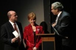 Elaine Orbach is presented with a check for $1 Million from
Dick Wolf for cancer rel Photo