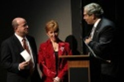 Elaine Orbach is presented with a check for $1 Million from
Dick Wolf for cancer rel Photo