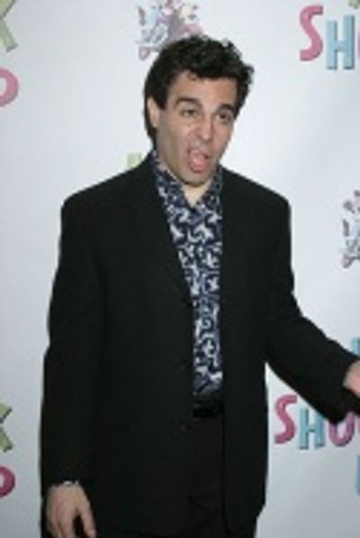 Funnyman Mario Cantone striking a funny pose  Photo