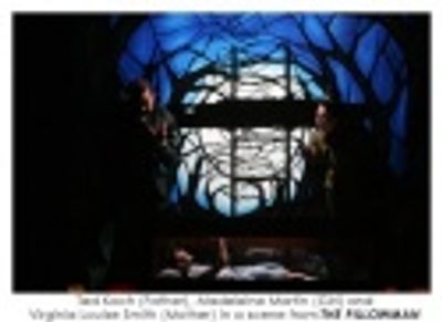 Ted Koch (Father), Madeleine Martin (Girl) and Virginia Louise Smith (Mother) in a sc Photo