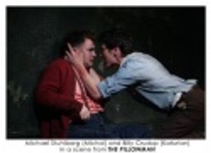 Michael Stuhlbarg (Michal) and Billy Crudup (Katurian) in a scene from THE PILLOWMAN. Photo