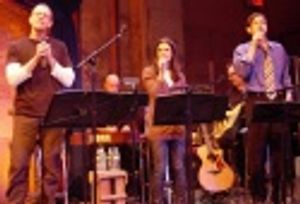 Adam Pascal, Lea Michele and Greg Naughton toward the end of the show, with musician  Photo