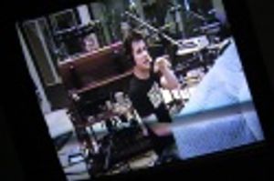 Musical supervisor and arranger Stephen Oremus through the monitor  Photo