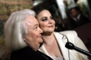 Delta's joined by her proud mother Jean Photo