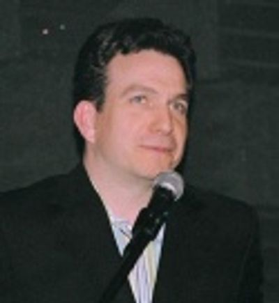 Associate Producer Eddie Varley on stage to introduce Rob Maitner Photo