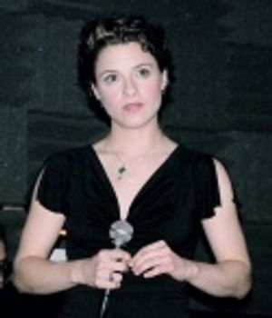 Jenn Gambatese singing The Promise Photo