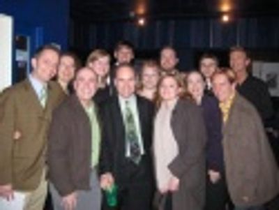 Composer Stephen Flaherty (center) surrounded by cast members and director Scott Ferg Photo