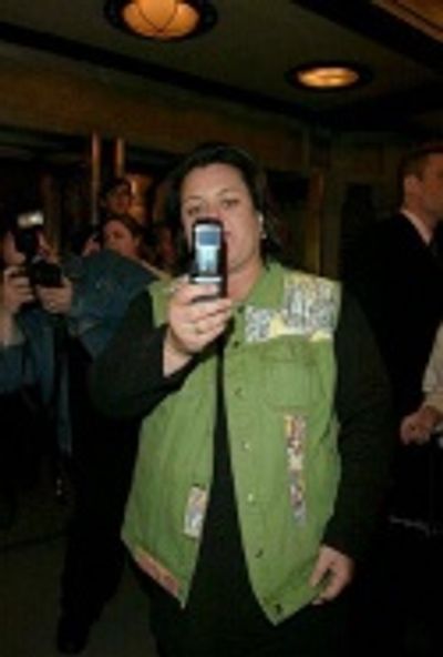 Rosie O'Donnell taking photos with her cell phone Photo