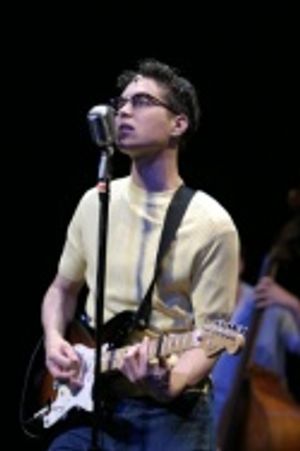 Justin Berkobien as Buddy Photo