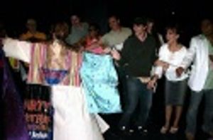 Dylis Croman shows off the robe Photo