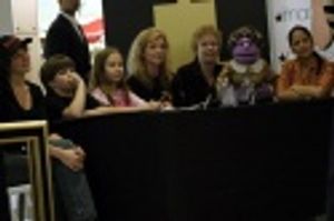 ...as the judges look on...  Photo