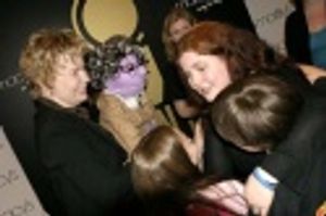 The judges congratulating Amy K. Browne  Photo