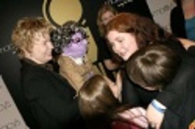 The judges congratulating Amy K. Browne  Photo