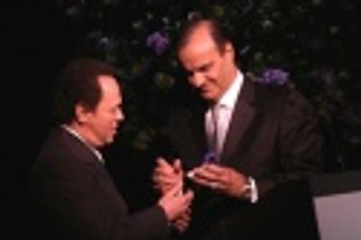 Billy Crystal receives The Actor's Fund's Artistic Achievement Award from Joe Torre
 Photo