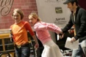 Christina clearing the stage for Joyce Chittick and Anika Ellis to perform "Baby, Dre Photo