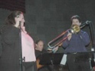 Accompanied on stage by trombone for
"Slide that Rusty Trombone"

 Photo