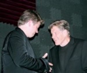 Rob Evan (who also served as host) welcomes the legendary
Peter Palmer to the stage Photo