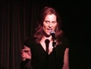 Kristy Cates (Elphaba u/s) belts "The Wizard and I"  Photo