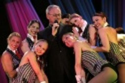 Victor getting cosy with the Rockettes

 Photo